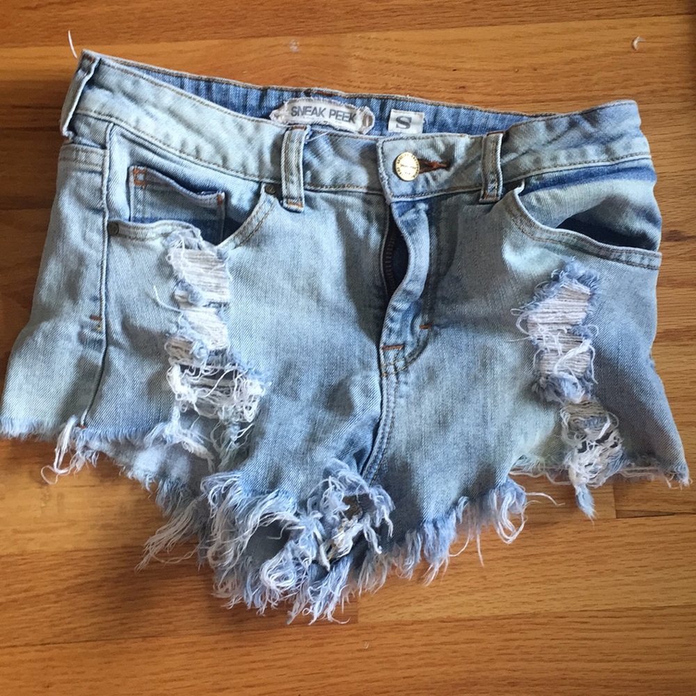 Sneak peek high waisted ripped jean shorts